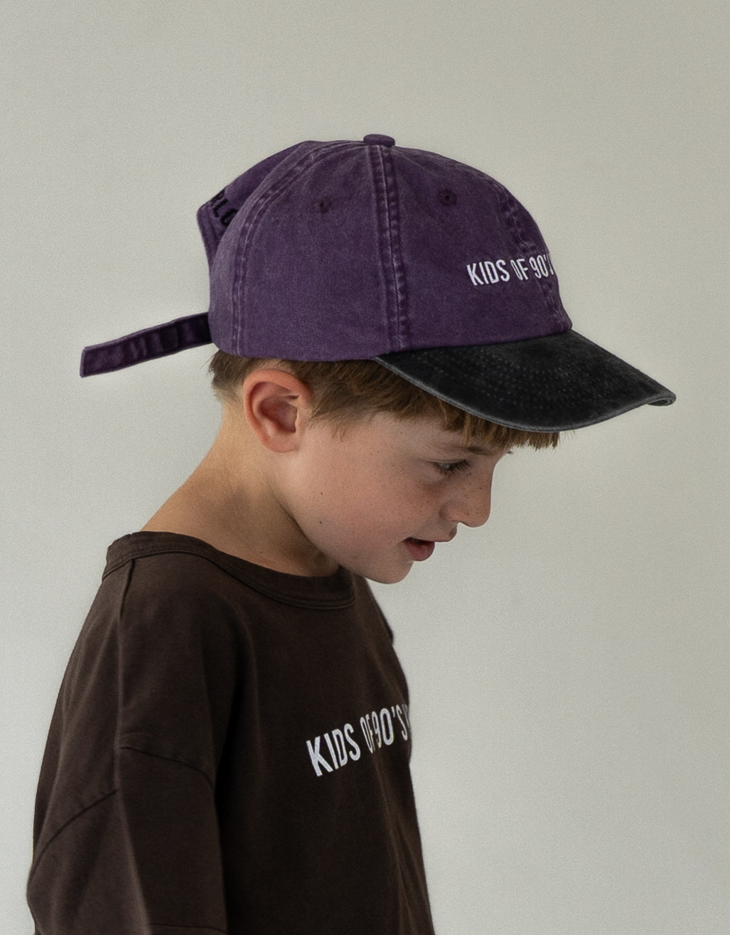 child wearing dad hat vintage baseball cap 