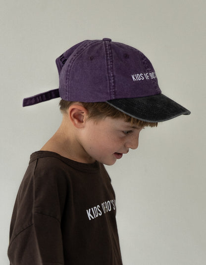 child wearing dad hat vintage baseball cap 